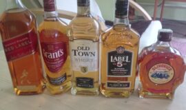 4 láhve whisky a jednu láhev R.Jelínek zlaté slivovice